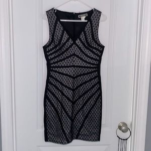 Little black dress. It says size Large it fits more Lee a size 4